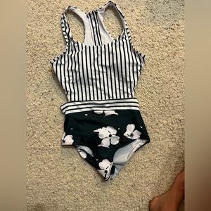 Swim suit - never worn.  Ordered wrong size and can’t return.  From gracesunny